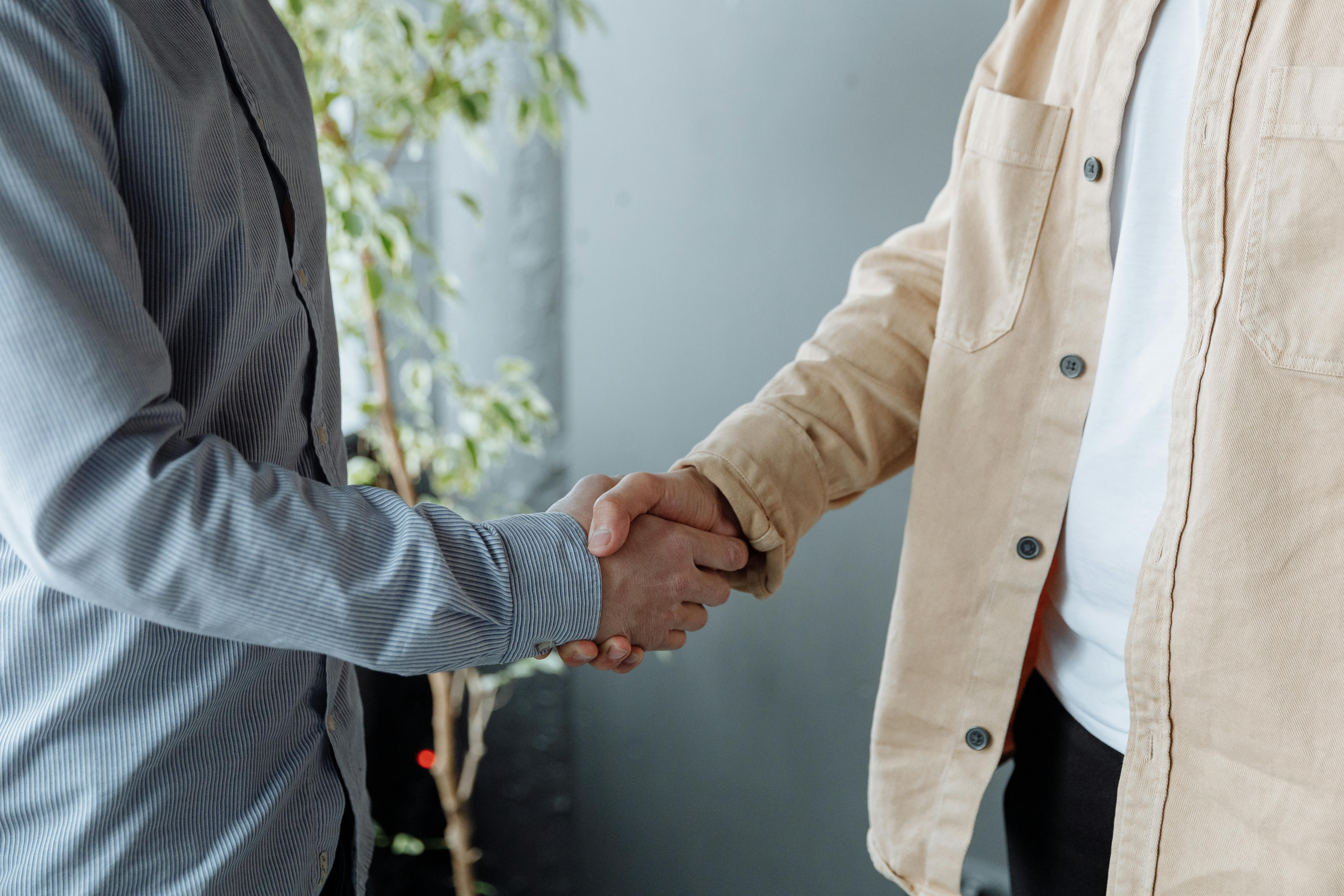 A handshake representing partnership and trust.
